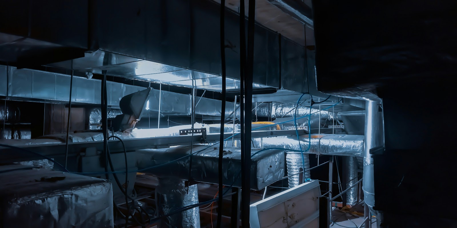 Mechanical systems visible through a glass building facade